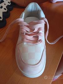Scarpe con rotelle/Pattini numero 32/34