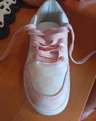 Scarpe con rotelle/Pattini numero 32/34