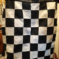 Gonna in pelle bianca e nera stile "Courreges"