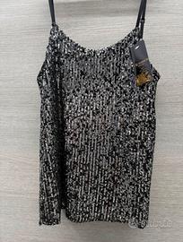 Top con paillettes argento e contrasto nero
