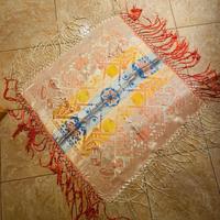 Telo decorativo orientale ricamato con frange