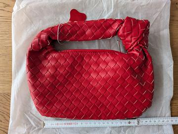 Borsa in pelle intrecciata con nodo