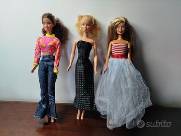 Lotto di 4 Barbie