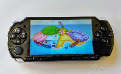 PSP Slim & Lite. Con tre giochi. Da collezione