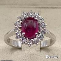 ANELLO ORO 18kt. CON DIAMANTI E RUBINO CABOCHON