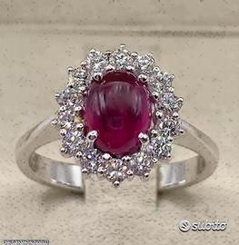 ANELLO ORO 18kt. CON DIAMANTI E RUBINO CABOCHON
