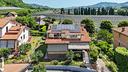 villa-bifamigliare-con-giardino-fotovoltaico-e-box