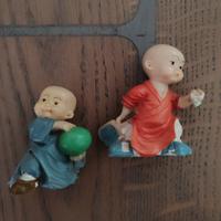 Statuine orientali, coppia di bambini che giocano