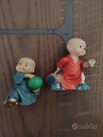 Statuine orientali, coppia di bambini che giocano