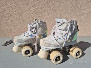 PATTINI A ROTELLE TG 28