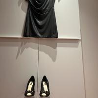 Mini vestito T38 nero se adatta bene al corpo