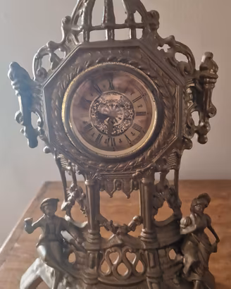 Orologio barocco in ottone