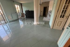 LUMINOSO QUADRILOCALE CON POSTO AUTO CONDOMINIALE