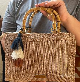 Borsa fatta a mano con maniglie in bambù