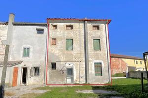 PORZIONE DI TRIFAMILIARE A RESANA