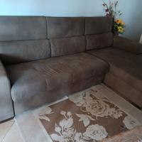 Divano letto angolare con contenitore.