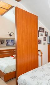 Armadio angolare 4 ante scorrevoli