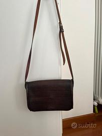 borsetta in cuoio pezzo unico da artigiano