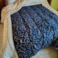 Piumone trapuntato in cotone damascato Blu e oro