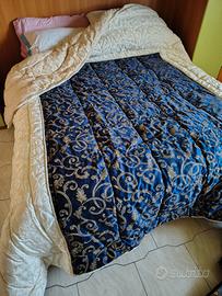 Piumone trapuntato in cotone damascato Blu e oro