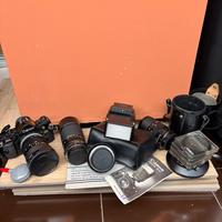 Canon A1 con flah, teleobbiettivi, filtri, borsa