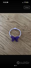 Bracciale bambina in plastica con farfalla