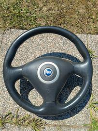 volante punto Sporting 