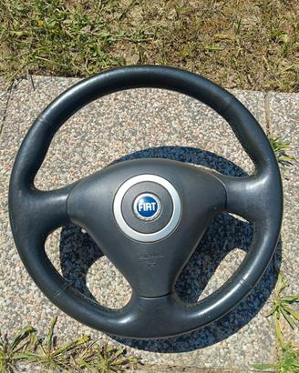 volante punto Sporting 