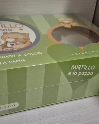 piatto per la pappa e libro cartonato bambino