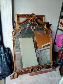 specchio con cornice in oro zecchino 