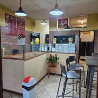 Tavola calda e polli alla brace