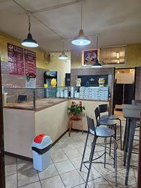 Tavola calda e polli alla brace