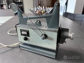 Proiettore per amatori CINE MAX con film d’epoca