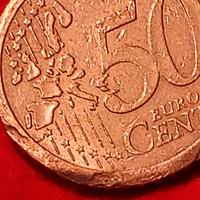 50 centesimi italiani con difetto 