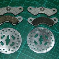 Due coppie Pastiglie e Dischi per Revo