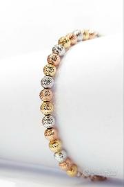 Bracciale milleluci oro giallo, bianco, rosa 18kt