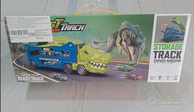 Camion dinosauro porta macchinine con pista