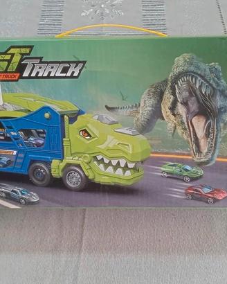 Camion dinosauro porta macchinine con pista