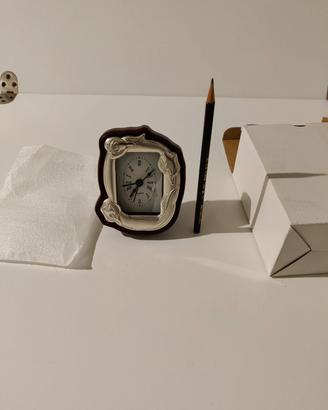 Orologio da tavolo con cornice in argento 