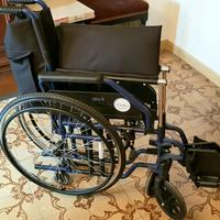 carrozzina richiudibile come nuova