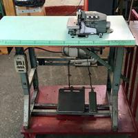 Machina per il taglio e cuci