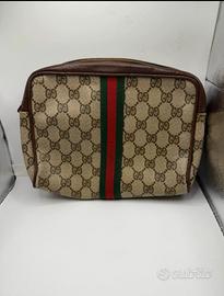 Pochette Gucci Vintage GG Plus / Supreme Clutch