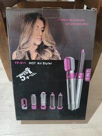 asciugacapelli e pettini vari