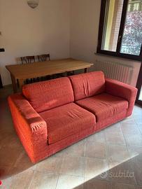 Divano letto 3 posti tessuto color rosso aranciato
