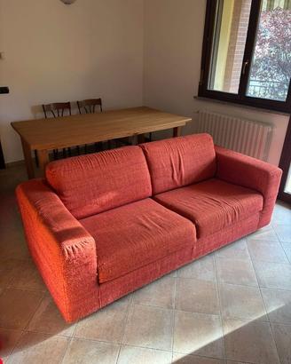 Divano letto 3 posti tessuto color rosso aranciato