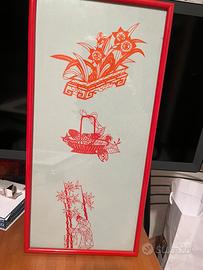 Quadro con disegno in rilievo e cornice rossa