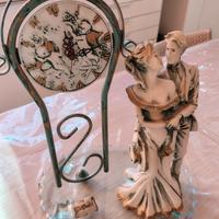 orologio con scultura soprammobile 