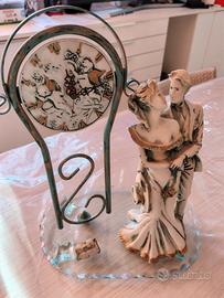 orologio con scultura soprammobile 