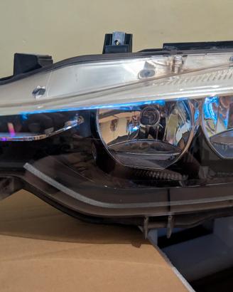 FARO BMW LATO SX (autista) 