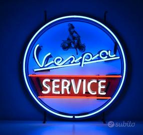 Insegna al neon con logo Vespa Service